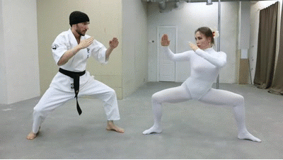 Karate ballet in white. Melanie destroys the bandits